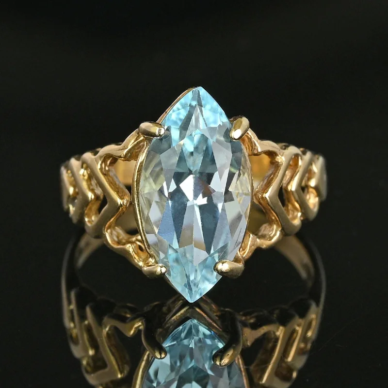 Smooth design rings-Vintage 3.75 Carat Marquise Cut Blue Topaz Ring in Gold