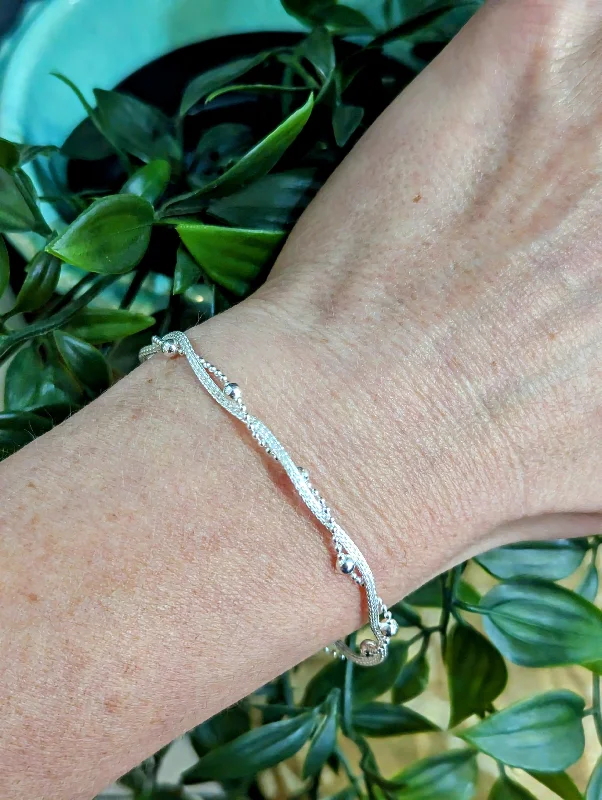 Sterling Silver Beads in a Twist Bracelet