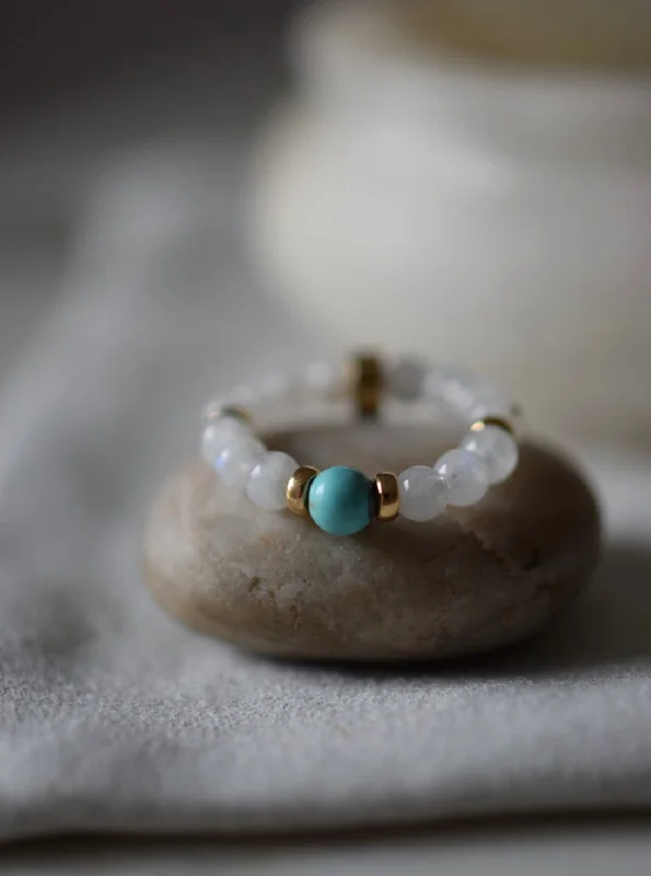 Tiny wing rings-BALANCE + NEW BEGINNINGS - LITTLE RIVER acupressure BEAD RING